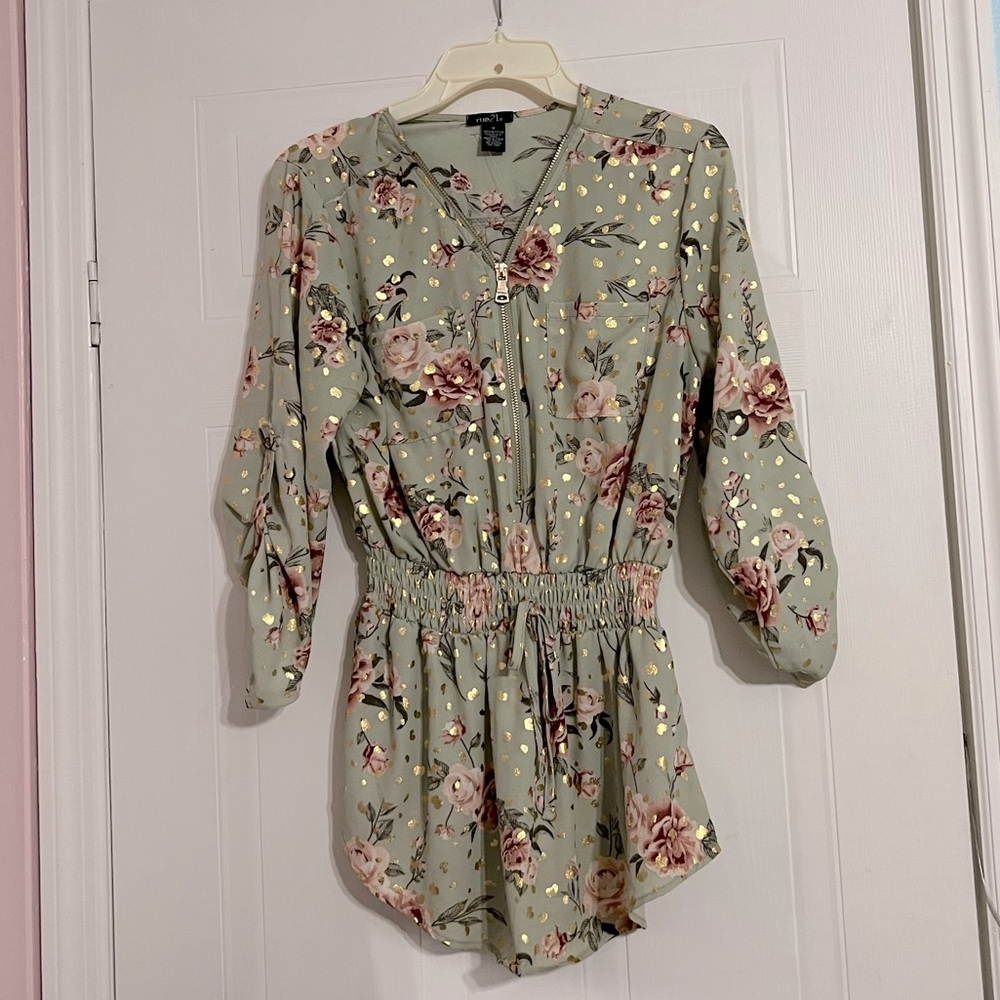 A cute, floral, flattering, bunched at the waist blouse
